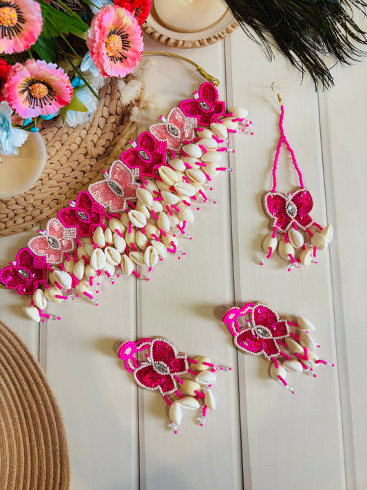 Pink Beaded Butterfly Haldi Jewellery Set with Cowrie Shells – Choker, Earrings & Maang Teeka