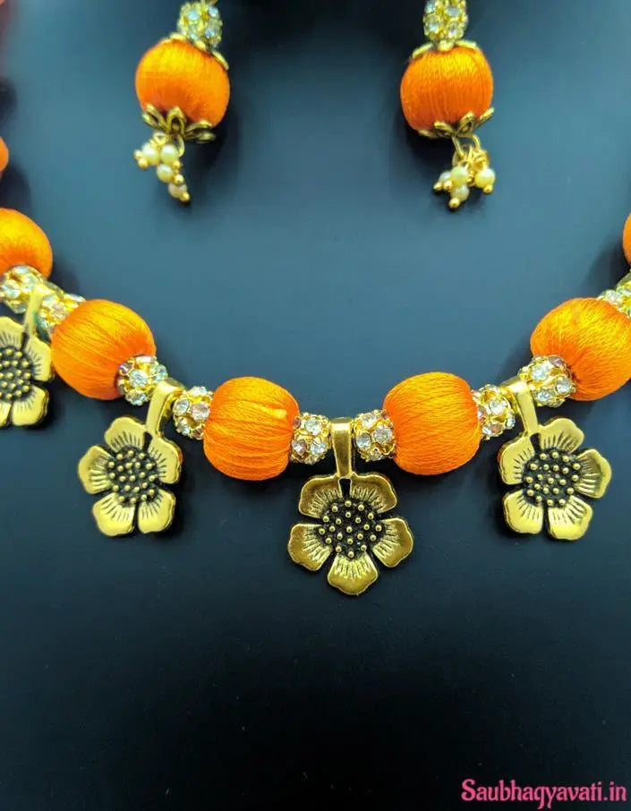 Orange Beads Short Silk Thread Necklace with Flower Pendent Design