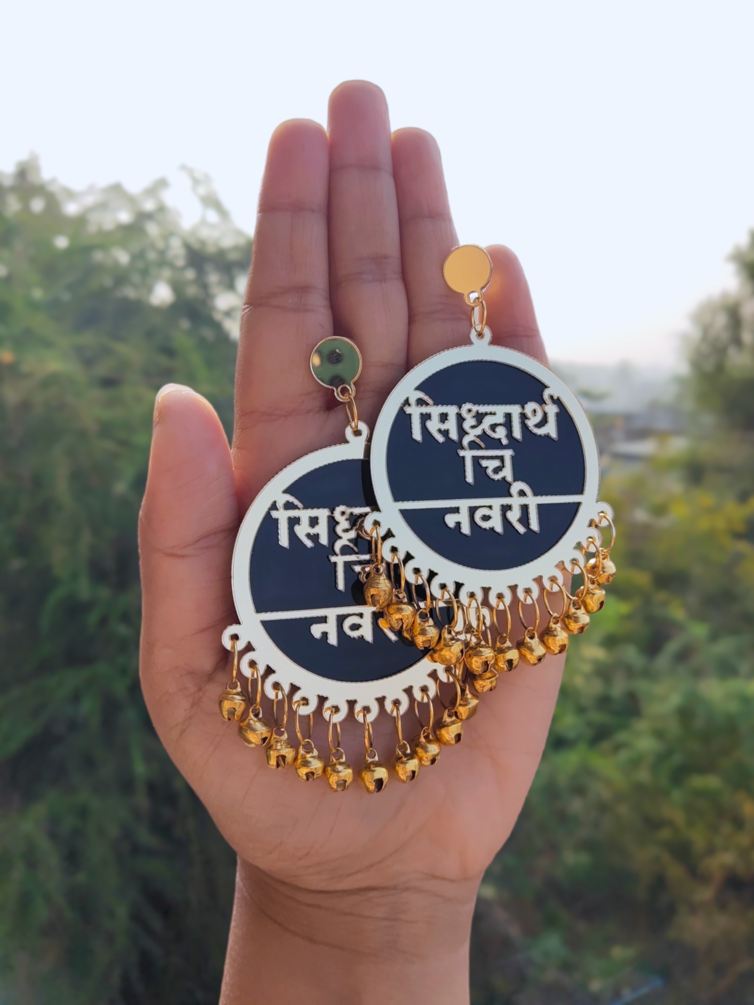 Sophisticated black Dulhaniya earrings adorned with intricate designs and personalized text in Hindi and Marathi, exemplifying exquisite craftsmanship and cultural allure.