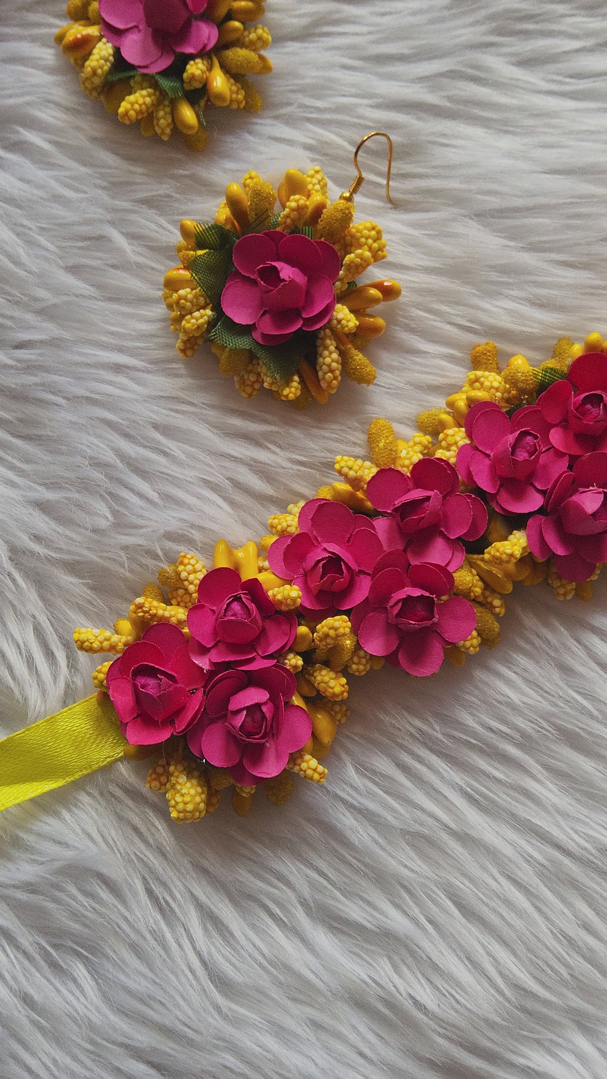 Vibrant yellow and pink color flower jewellery set for haldi